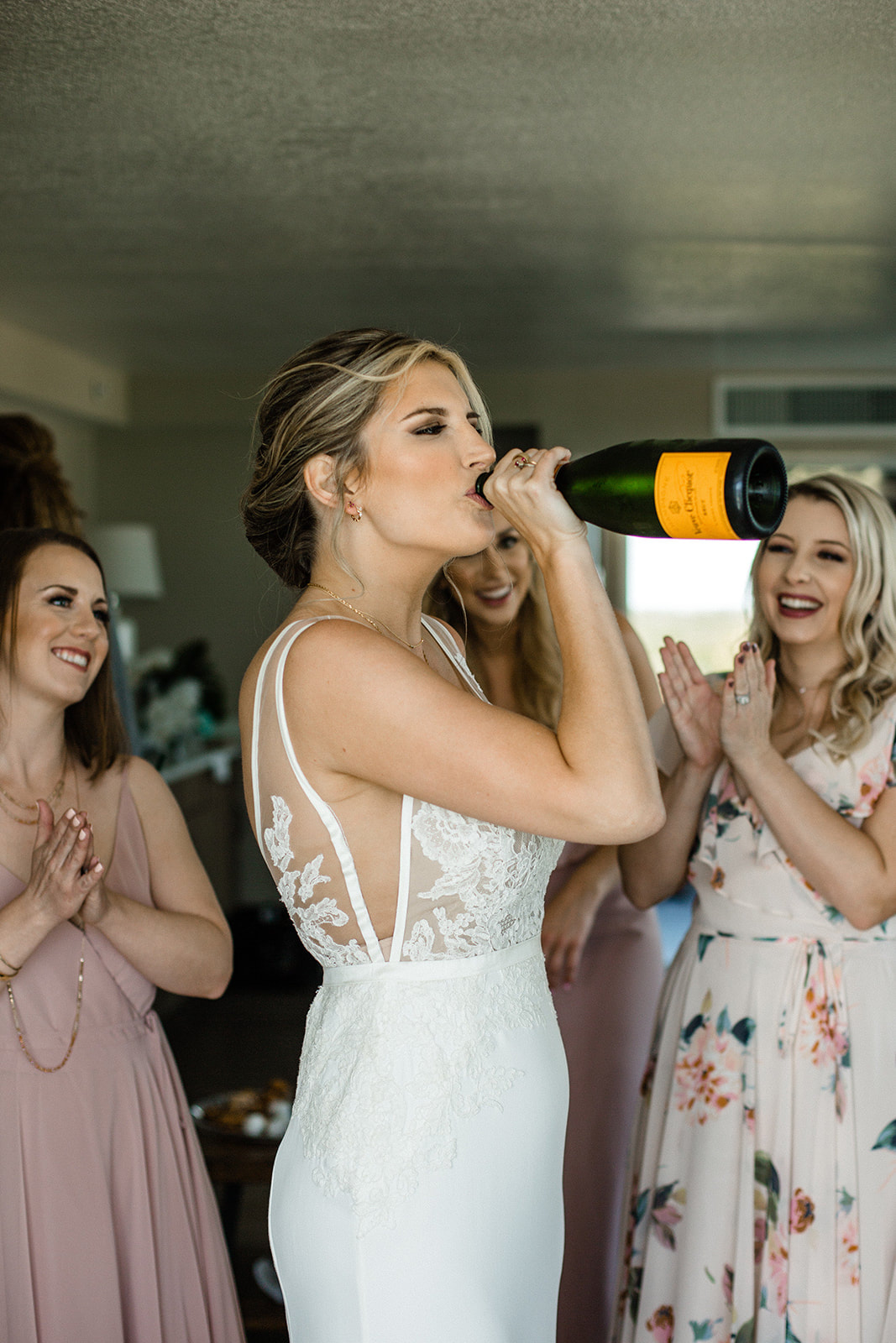 Islamorada wedding, bride drinking champagne
