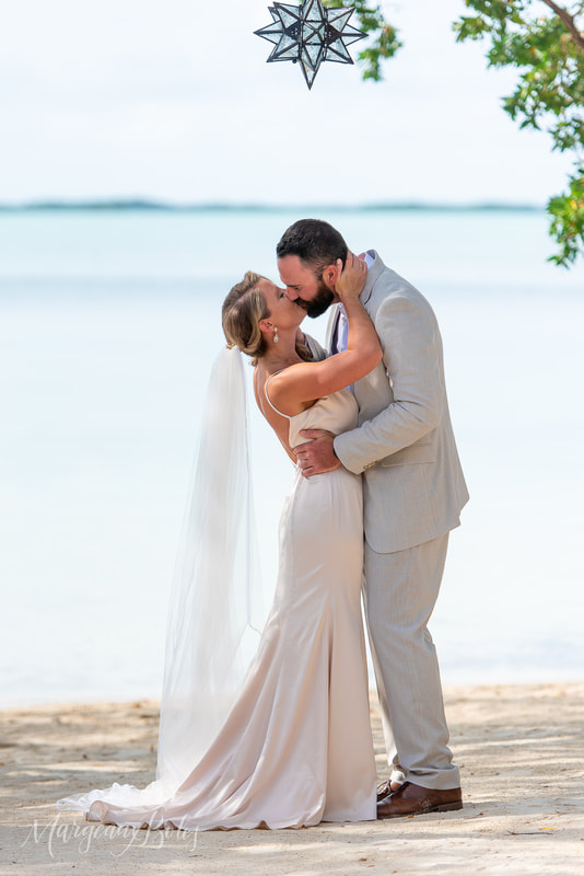 Key Largo wedding, bride and groom kiss