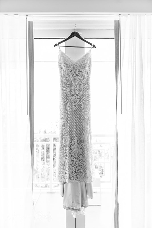 Key Largo wedding, wedding dress hanging in window
